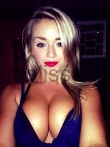 Blue bra, red lipstick, cleavage